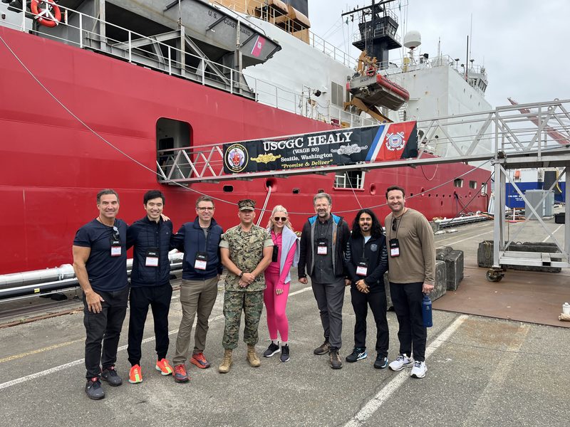 JCOC participants in front of USCG icebreaker Healy